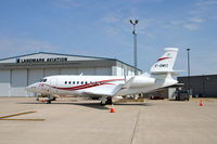 C-GMII @ KCID - At Landmark ramp - I believe this is a Falcon 2000!