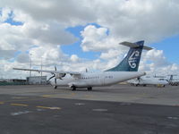ZK-MCX @ NZAA - taxying off apron - by magnaman