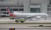 N728AN @ MIA - American 777-300 water canon salute
