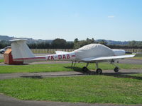 ZK-DAB @ NZAR - covered at flight centre - by magnaman