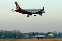 OE-LEY @ EDDT - Inbound traffic on rwy 26R is observed by outbound traffic on rwy 26L.... - by Holger Zengler