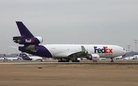 N583FE @ KMEM - MD-11F - by Mark Pasqualino