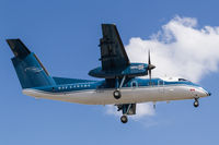 C-GCFK @ CYYZ - On short final for runway 23 at Toronto Pearson - by BlindedByTheFlash
