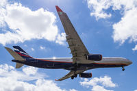 VQ-BMY @ CYYZ - On short final for runway 23 at Toronto Pearson - by BlindedByTheFlash