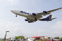 N496MC @ CYYZ - On short final for runway 23 at Toronto Pearson over Airport Rd. and the iconic gas station. - by BlindedByTheFlash