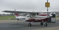 N2389G @ KRHV - A very nice transient 2006 Cessna T206H waiting for the clouds to clear up for departure. - by Chris L.