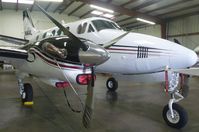 N444L @ KRHV - A rare King Air E90 sitting inside the Lafferty Aircraft Sales hangar waiting to be sold. - by Chris L.