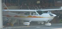 N2177C @ KRHV - A transient and colorful 1978 Cessna 177B Cardinal sitting inside the local avionics shop for some new avionics. - by Chris L.