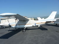 N68TB @ KRHV - A long time local 1981 Cessna T210N sitting next to the Lafferty Aircraft Sales hangar. The TB in the call sign stands for Tweety Bird, as there is a blue bird next to the call sign on the tail. - by Chris L.