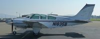 N1835B @ KRHV - A transient 1977 Beechcraft Baron 55 sitting at the transient ramp for lunch. - by Chris L.
