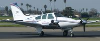 N1835B @ KRHV - A transient 1977 Beechcraft Baron 55 sitting at the transient ramp for lunch. - by Chris L.
