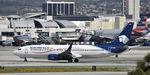 EI-DRC @ KLAX - Taxiing to gate at LAX - by Todd Royer