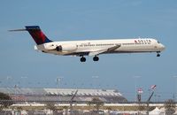 N944DN @ DAB - Delta MD-90 in front of the Daytona 500