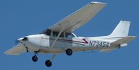 N73454 @ KSJC - A 1976 Cessna 172M on short approach for runway 30L at San Jose International. This plane is based out of Reid-Hillview for a flight school. - by Chris L.