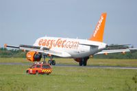 G-EZED @ LFRB - Airbus A319-111, Reverse thrust landing rwy 25L, Brest-Bretagne Airport (LFRB-BES) - by Yves-Q