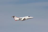 N580JS @ KLAS - EMB-500 - by Mark Pasqualino