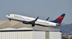 N380DA @ KLAX - Departing LAX on 25R - by Todd Royer