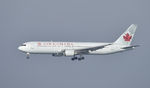 C-FCAE @ KSFO - Landing at SFO - by Todd Royer
