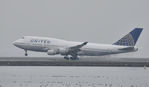 N177UA @ KSFO - Landing at SFO - by Todd Royer