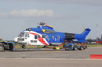 G-BRXU @ EGSH - One of three Super Puma's departing Norwich by road - by Graham Reeve