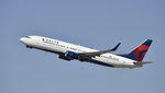 N374DA @ KLAX - Departing LAX on 25R - by Todd Royer