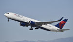 N394DL @ KLAX - Departing LAX on 25R - by Todd Royer