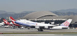 B-18719 @ KLAX - Departing LAX on 25R - by Todd Royer