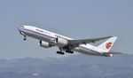 B-2097 @ KLAX - Departing LAX on 25R - by Todd Royer