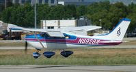 N8928X @ KSJC - A 1961 Cessna 182 landing early on 30L at San Jose International. I've seen this one at Reid-Hillview once before, and I may have a picture of it there too. - by Chris L.
