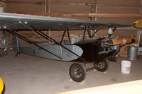 N2864A @ KANE - Tucked away in a hangar - by alanh