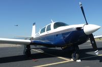 N5695C @ KRHV - A transient 1983 Mooney M20J sitting on the ramp at Nice Air. - by Chris L.