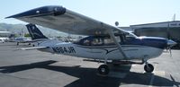N964JR @ KRHV - A nice transient 2013 Cessna T206H sitting in front of the Nice Air hangar at Reid Hillview. - by Chris L.