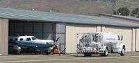 N915TV @ KRHV - A local Piper Meridian getting refueled for an early departure the next morning. It's painted in San Jose Sharks colors, the NHL Hockey team for our city. The owners of this Meridian have had Sharks season tickets for years. - by Chris L.