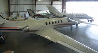 N255WT @ KRHV - 2 Cessna Citations inside the Lafferty Aircraft hangar. - by Chris L.