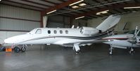 UNKNOWN @ KRHV - A local Cessna Citation Jet 1 sitting inside the Lafferty Aircraft Sales hangar. - by Chris L.