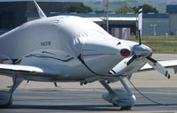 N422TB @ KLVK - A 2006 Cirrus SR22 sitting on the transient ramp at Livermore Municipal Airport. - by Chris L.