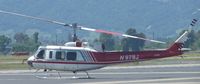 N97HJ @ KLVK - A transient 1974 Bell 205A sitting on the ramp at Livermore. - by Chris L.