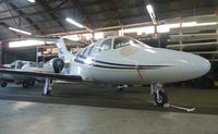 N66BX @ KTCY - A rare 2008 Eclipse 500 sitting inside the Skyview Aviation hangar at Tracy Municipal Airport. - by Chris L.