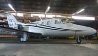 N66BX @ KTCY - A rare 2008 Eclipse 500 sitting inside the Skyview Aviation hangar at Tracy Municipal Airport. - by Chris L.