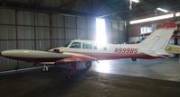 N999BS @ KTCY - A 1968 Cessna 320F sitting inside the Skyview Aviation hangar for repairs. - by Chris L.