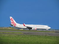 VH-VOO @ NZAA - landing at second attempt - by magnaman