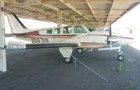 N587AN @ KRHV - A local Beechcraft Baron 58 owned by the owner of Nice Air sitting under the shelters at Reid Hillview. - by Chris L.