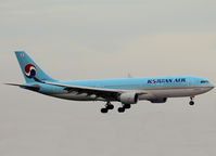 HL8211 @ AMS - Landing on runway C18 of Schiphol Airport - by Willem Göebel