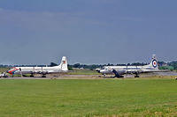 LV-JZM @ EGSS - LV-JZM   Canadair CL-44 D4-6 [33] (TAR Transporte Aero Rioplatense) & G-ATZH/XV196   Canadair CL-44 D4-2 (21) (Transmeridian) Stansted~G 17/07/1972.  G-ATZH painted up as XV196 for the film 