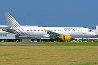 EC-MBE @ EGFF - A320-211, call sign Vueling 1241, previously F-WWDG, A6-ABL, EI-FDU, seen landing on runway 12, out of Alicante, note open reverse thruster doors.