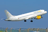 EC-MBE @ EGFF - A320-211, call sign Vueling 12YQ, previously F-WWDG, A6-ABL, EI-FDU, seen departing runway 12 en-route to
Alicante.