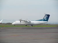 ZK-NEG @ NZAA - entering taxyway - by magnaman