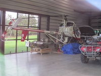 ZK-HRL @ NZKK - in Campbell copters hangar side of SH10, keri keri - by magnaman