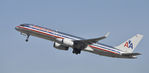 N677AN @ KLAX - Departing LAX on 25R - by Todd Royer