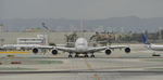 HL7626 @ KLAX - Taxing for departure at LAX - by Todd Royer